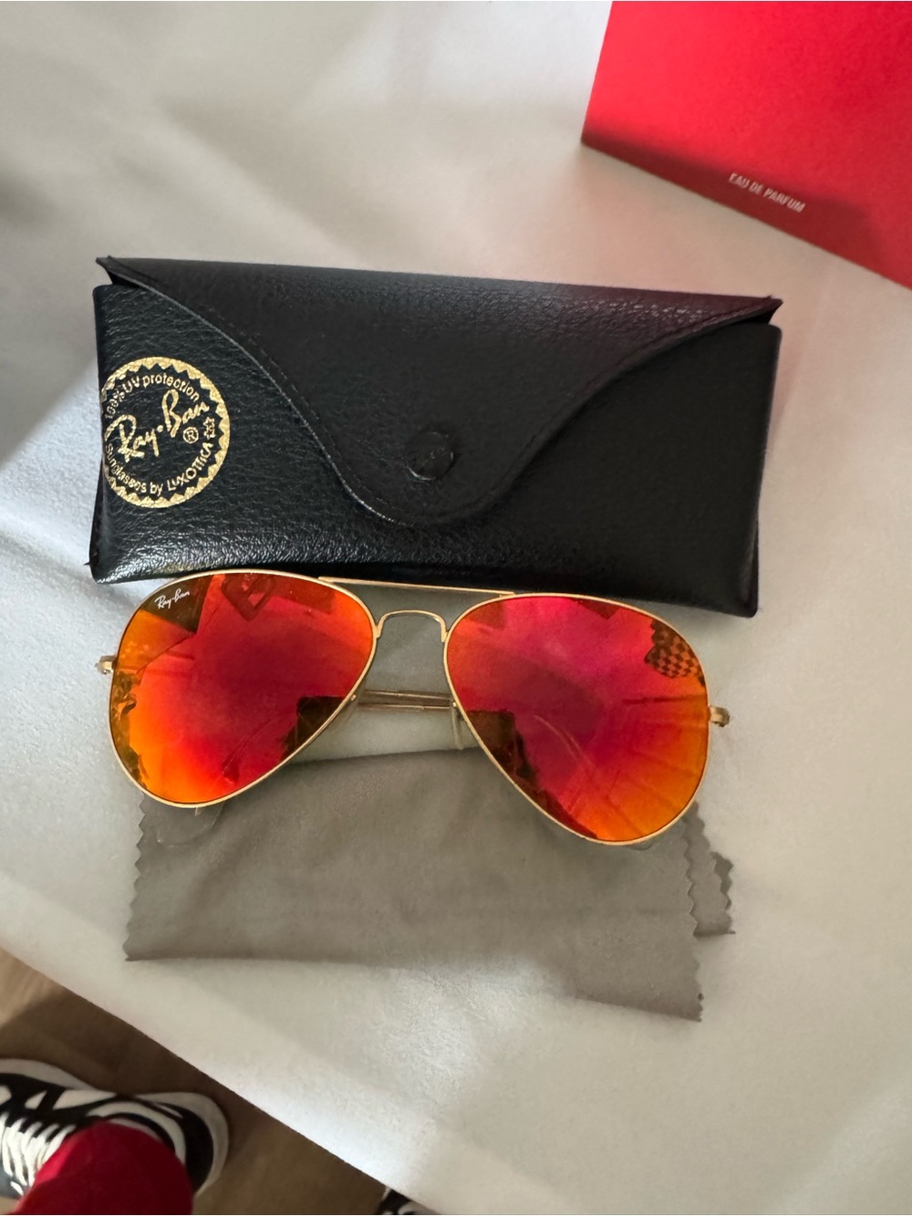Ray-Ban Gold Frame Sunglasses with red Lenses
